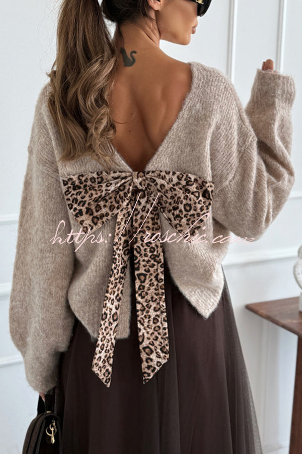 Pull en tricot imprimé léopard avec nœud et fente au dos