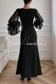 Robe longue à manches longues et col en V avec fente haute