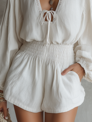 Lace-Trim Smocked Long Sleeve Romper with Ruffle Detail