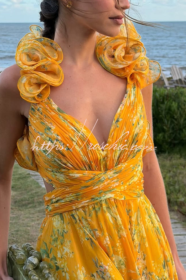 Robe longue en mousseline florale à volants et dos découpé