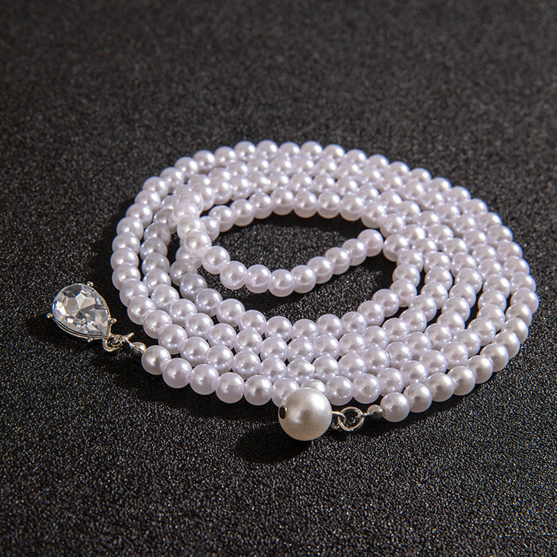 Pearl Tassel Necklace with Geometric Accents