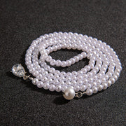 Pearl Tassel Necklace with Geometric Accents
