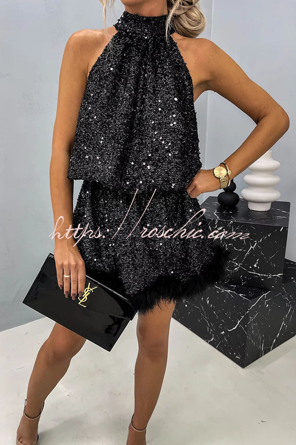 Mini-robe nuisette dos nu à bordure en plumes et sequins