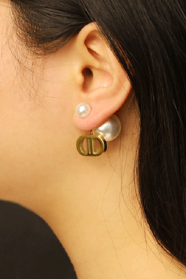 Boucles d'oreilles vintage en perles en forme de double D