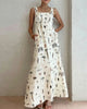 Maxikleid mit botanischem Print und Bindeträger und offenem Rücken