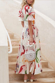 Robe longue boutonnée à manches bouffantes et motif floral aquarelle