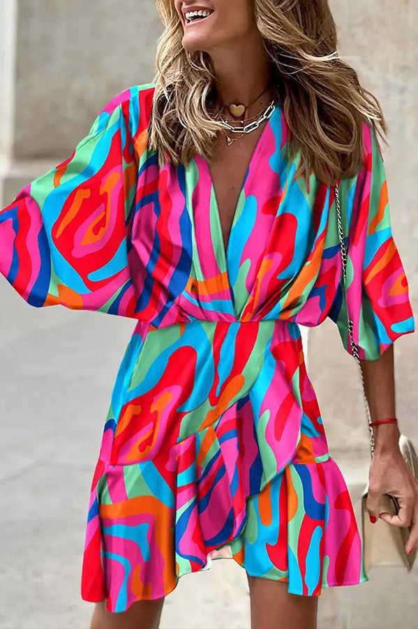 Mini-robe imprimée avec col en V et coupe ample
