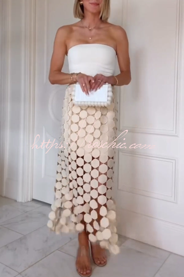 Jupe longue brodée transparente avec taille élastique et ourlet à pompon