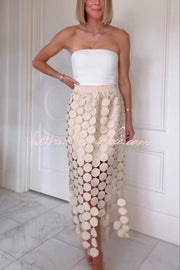 Jupe longue brodée transparente avec taille élastique et ourlet à pompon