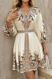 Printed V-Neck Lantern Sleeve Mini Dress with Waist Tie