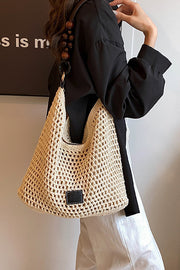 Sac à bandoulière rétro en paille tissée creuse
