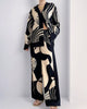 Artistieke graffiti-set met oversized shirt en broek met wijde pijpen