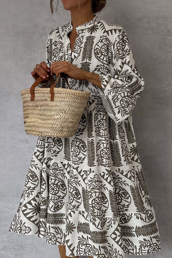 Mini-robe imprimée à col en V et manches cloche | Coupe ample pour les vacances