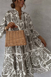 Mini-robe imprimée à col en V et manches cloche | Coupe ample pour les vacances