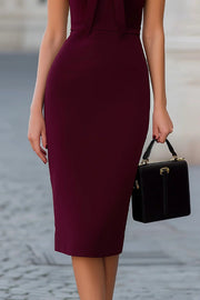 Robe midi ajustée à col montant et nœud papillon de couleur unie