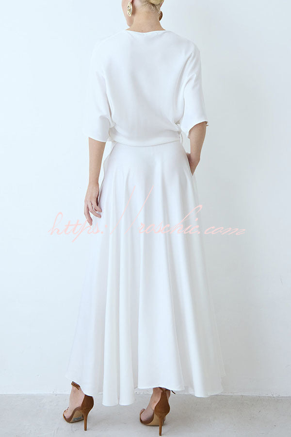 Robe longue portefeuille en satin avec manches larges et poche