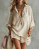 Solide tweedelig shirt en short met korte mouwen en zakken